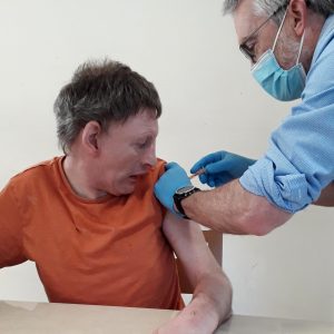 Gary gets his COVID-19 vaccine from a doctor